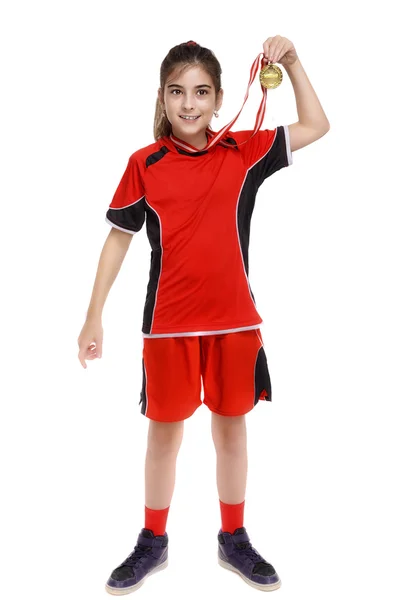 Dziewczyna piłka nożna gracz pokazuje złoty medal — Zdjęcie stockowe