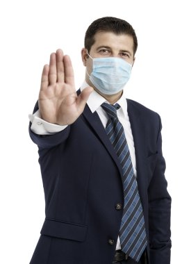 grip ve önünde el karşı koruyucu maske ile işadamı, 