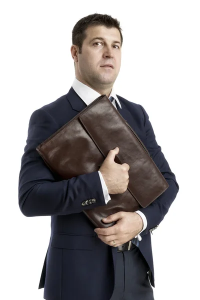 Ο άνθρωπος των επιχειρήσεων σε μαύρο κοστούμι χέρι που κρατά το Χαρτοφύλακα — Φωτογραφία Αρχείου