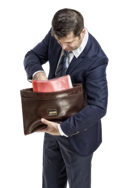 Businessman gets documents from the portfolio — Stock Photo, Image