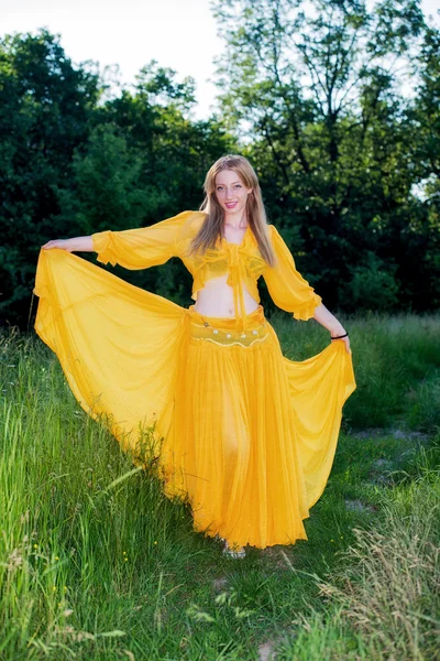 https://st.depositphotos.com/1037171/4884/i/450/depositphotos_48848869-stock-photo-beautiful-woman-in-yellow-dress.jpg