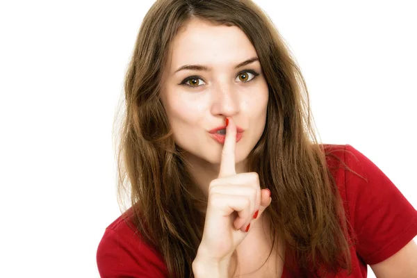 Portret van mooie vrouw met vinger op lippen, geïsoleerd over w — Stockfoto