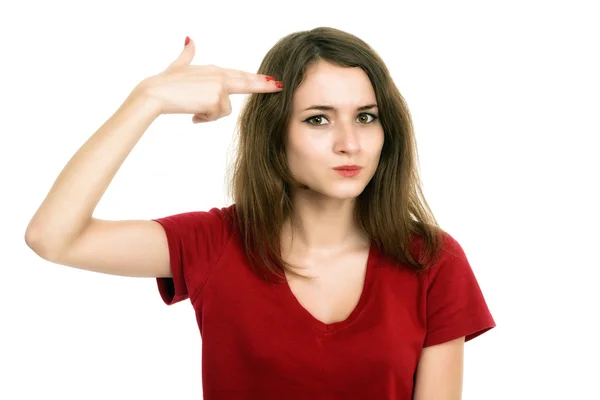 Beautiful girl shooting at her head with hand gun — Stock Photo, Image