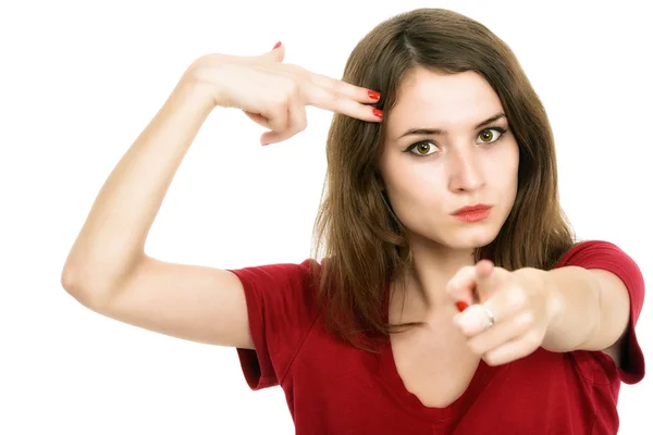 Beautiful girl shooting at her head with hand gun — Stock Photo, Image