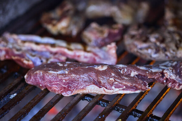 various pieces of grilled meat, grilled food.