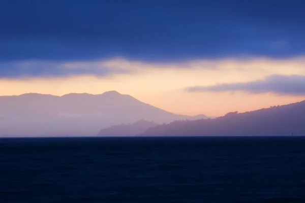 海洋岬日落背景 — 图库照片