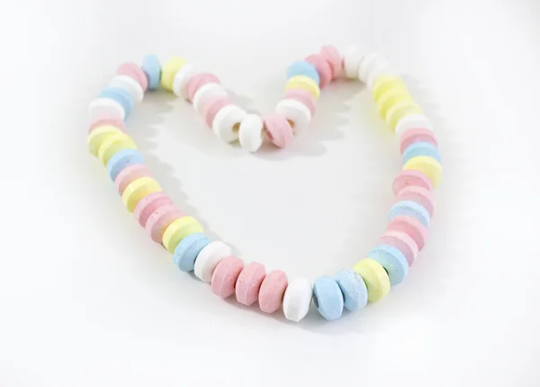 Süßigkeiten Perlenkette isoliert auf weiß — Stockfoto