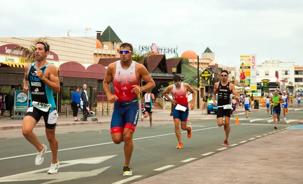 CORRALEJO - April 07: Participant at the running part of the rac — Stock Photo, Image