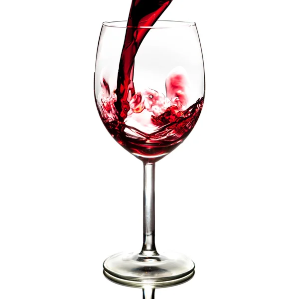 Pouring red wine isolated — Stock Photo, Image