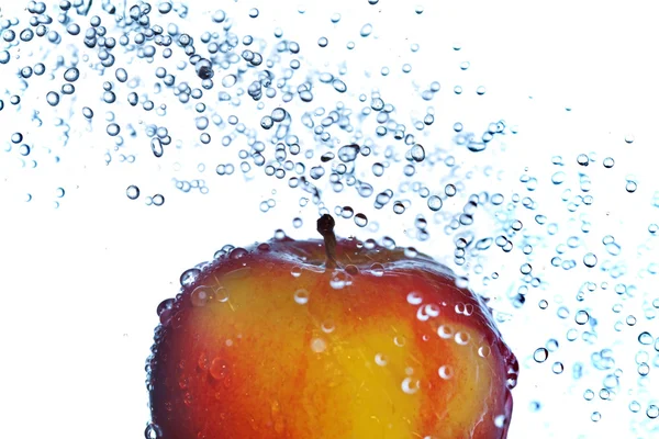 Washing apple Royalty Free Stock Images