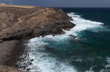 Gran Canaria, Telde belediyesinin kıyı bölgelerinin koyu volkanik maddelerini aşındırdı