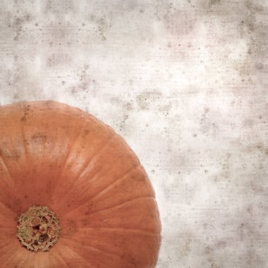 Kare biçiminde eski kağıt kaplama arka planda turuncu Cadılar Bayramı balkabağı