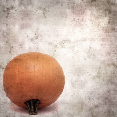 Kare biçiminde eski kağıt kaplama arka planda turuncu Cadılar Bayramı balkabağı