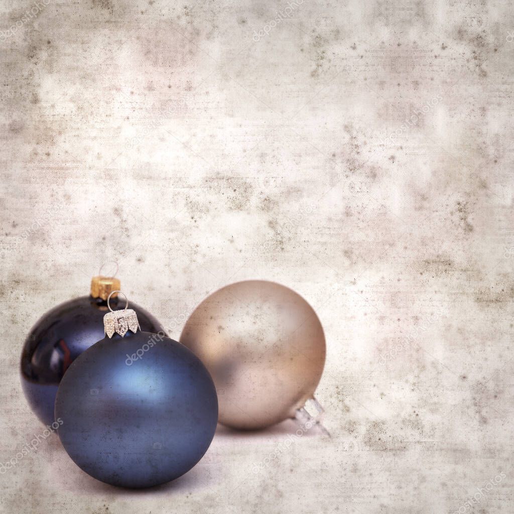 stylish textured old paper background with Christmas baubles