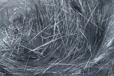 Kaliteli metalik gümüş renkli iplikler ayrıca lametta arkaplanı olarak da adlandırılır