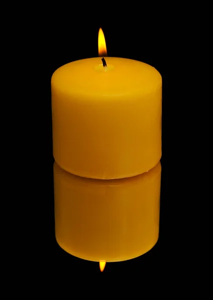 Yellow Short Squat Burning Candle Black Mirror — Stock Photo, Image