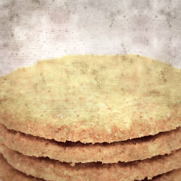 圆形烘焙燕麦饼的方方方正正的老式纹理纸背景 — 图库照片
