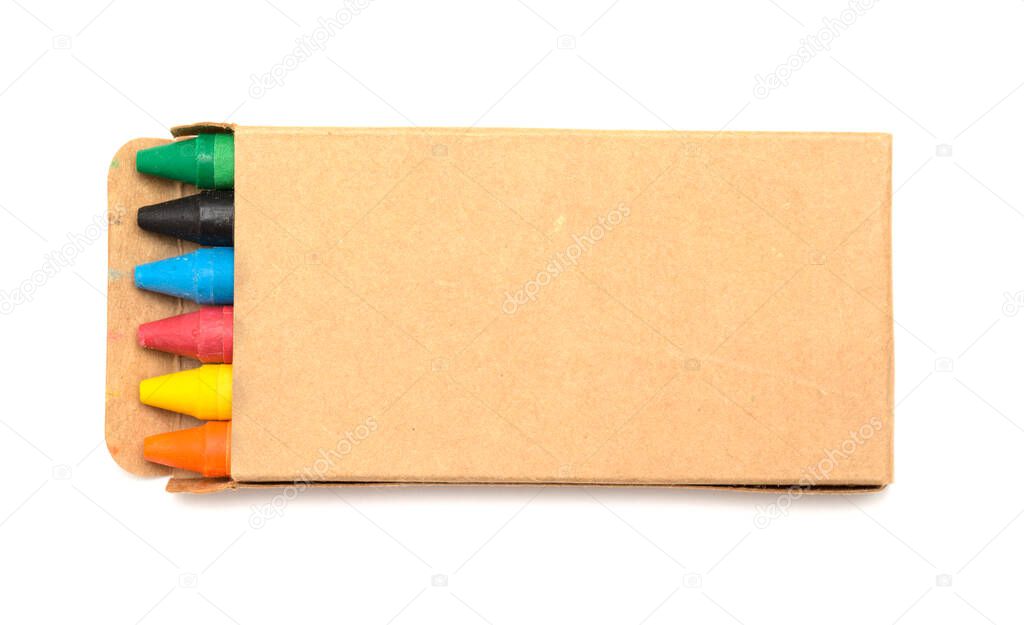 small box of color wax crayons, isolated on white background