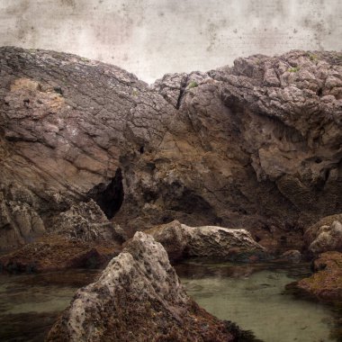 Şık desenli eski kağıt kare arka plan. Cantabria 'nın kıyı kesiminin manzarası. Adı Costa Quebrada, Kırık Kıyı.