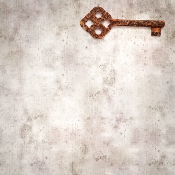 Stylish Textured Old Paper Background Old Rusty Key — стоковое фото