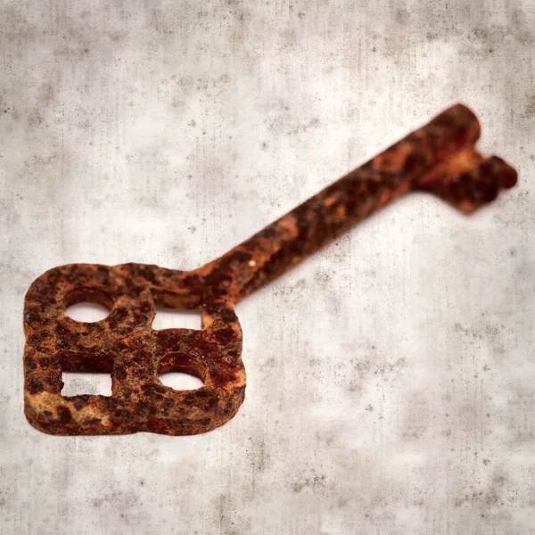 Stylish Textured Old Paper Background Old Rusty Key — стоковое фото