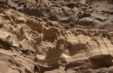Gran Canaria, Punta de las Arenas 'ın batı yakasındaki vadilerde inanılmaz kum taşı erozyon figürleri, Playa de Artenara olarak da bilinir.