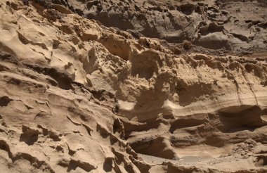 Gran Canaria, Punta de las Arenas 'ın batı yakasındaki vadilerde inanılmaz kum taşı erozyon figürleri, Playa de Artenara olarak da bilinir.