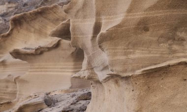 Gran Canaria, Punta de las Arenas 'ın batı yakasındaki vadilerde inanılmaz kum taşı erozyon figürleri, Playa de Artenara olarak da bilinir.