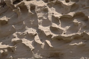 Gran Canaria, Punta de las Arenas 'ın batı yakasındaki vadilerde inanılmaz kum taşı erozyon figürleri, Playa de Artenara olarak da bilinir.