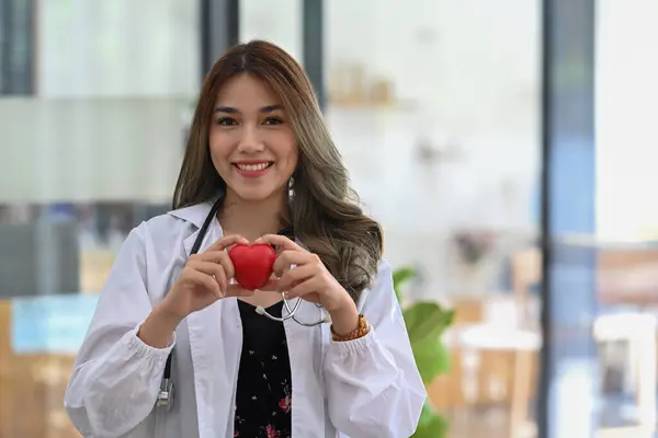 Smiling Asian Female Doctor White Uniform Standing Medical Office Holding — Stock Photo, Image