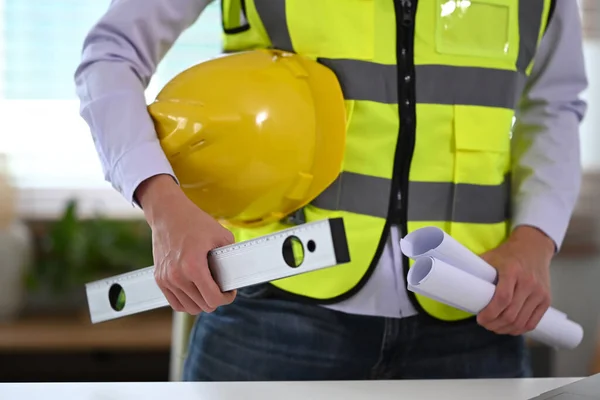 Construction Engineer Holding Roll Architectural Projects While Standing Creative Office — Stock Photo, Image