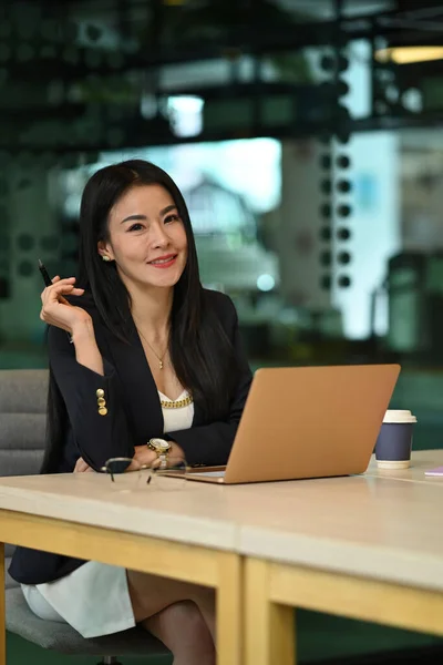 Portrait Confident Asian Female Manager Sitting Laptop Computer Office Smiling — Fotografia de Stock