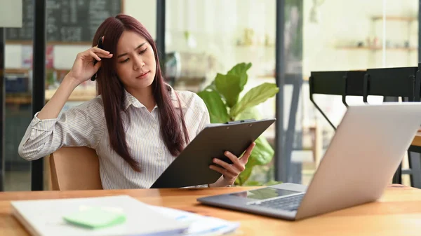 Stressed business woman having problem with difficult online project.