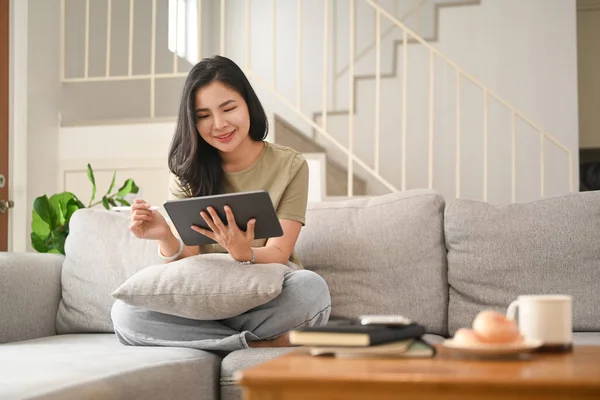 Happy Young Asian Woman Sitting Bright Living Room Using Digital — Stockfoto