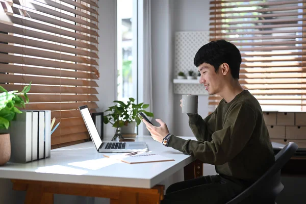 Side View Asian Man Drinking Coffee Reading Online News Smart — Stok fotoğraf