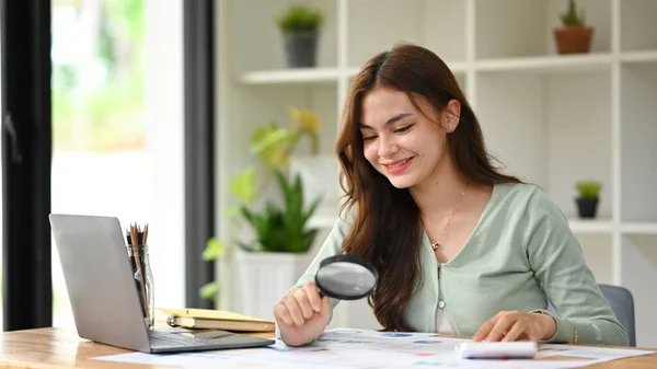 Young Female Auditor Inspecting Financial Document Magnifying Glass Office Desk — 스톡 사진