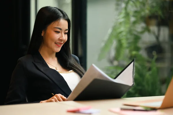 Smiling Female Manager Checking Financial Report Correspondence Her Workplace — ストック写真