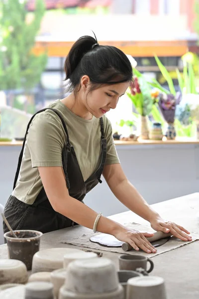 Shot Young Asian Woman Wearing Apron Creating Handmade Ceramic Bowl — Stockfoto