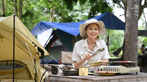 Young Woman Tourist Sitting Camping Tents Preparing Food Dinner Portable — Stockfoto