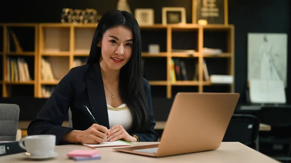Charming Millennial Businesswoman Working Laptop Making Notes Notepad — ストック写真