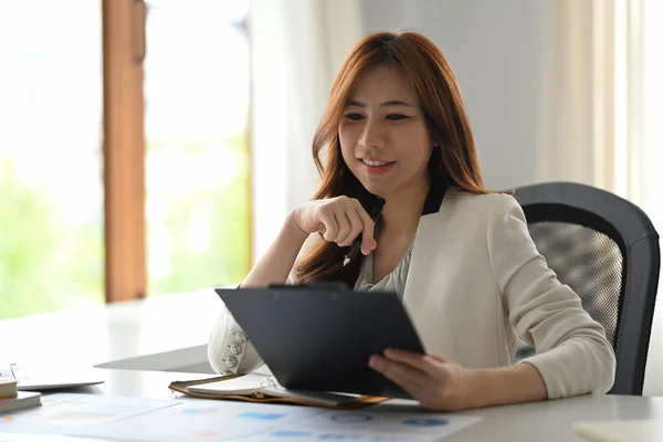 Gorgeous Asian Woman Entrepreneur Examining Numerical Data Financial Document — Foto Stock