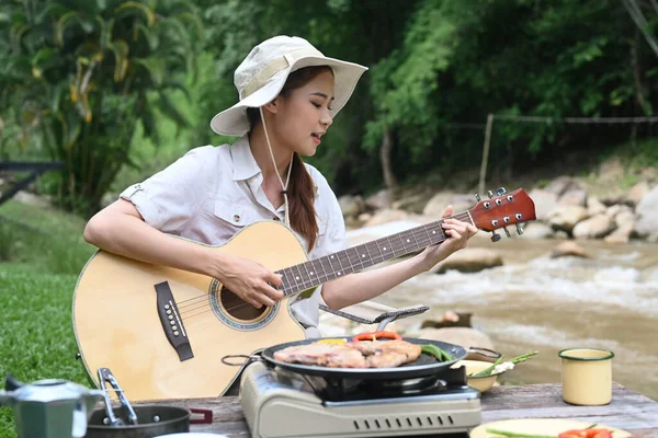 Happy Young Woman Playing Guitar Camping Alone River Bank Beautiful — Stockfoto