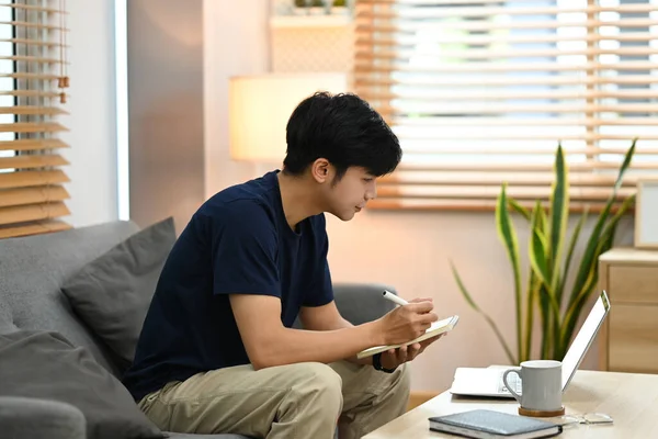 Side View Asian Male Freelancer Working Online Laptop Computer Couch — 스톡 사진