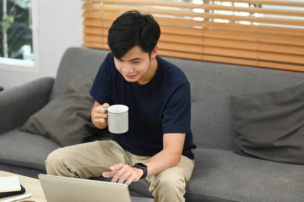 Asian Man Casual Clothes Drinking Coffee Surfing Internet Checking Email — Stock Fotó
