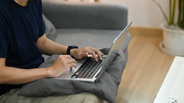 Cropped View Man Sitting Couch Working Online Surfing Internet Laptop — Foto de Stock