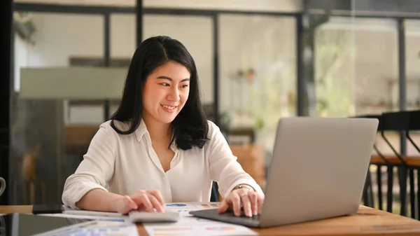 Charming Female Economist Using Laptop Computer Calculator Corporate Office — Stock fotografie