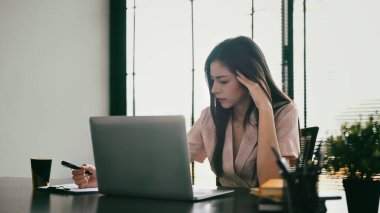 Stressed businesswoman thinking find solution problem of work. Emotional pressure, stress at work concept.