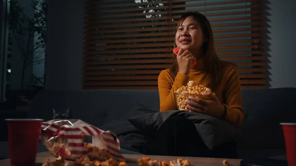 Smiling Young Woman Watching Eating Popcorn Sofa Spending Her Free — Fotografia de Stock