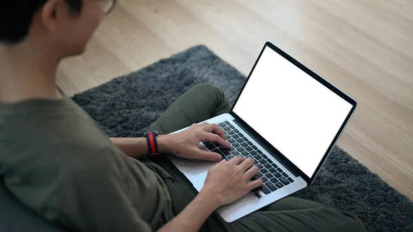 Young Man Casual Clothes Using Laptop While Sitting Carpet Bright — Foto de Stock