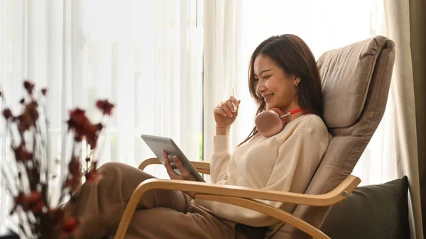 Happy Young Woman Relaxing Armchair Reading Online News Digital Tablet — 图库照片